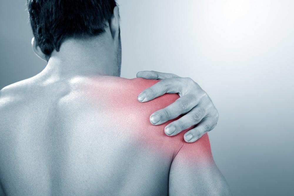 How can physiotherapy help with frozen shoulders?